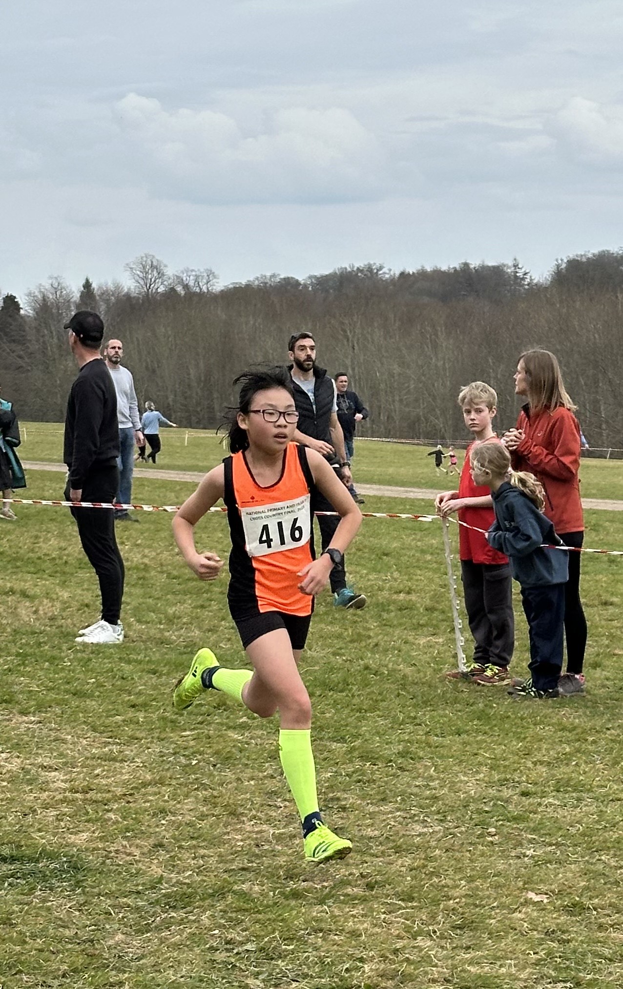 Photo of Haysan running at the cross-country event