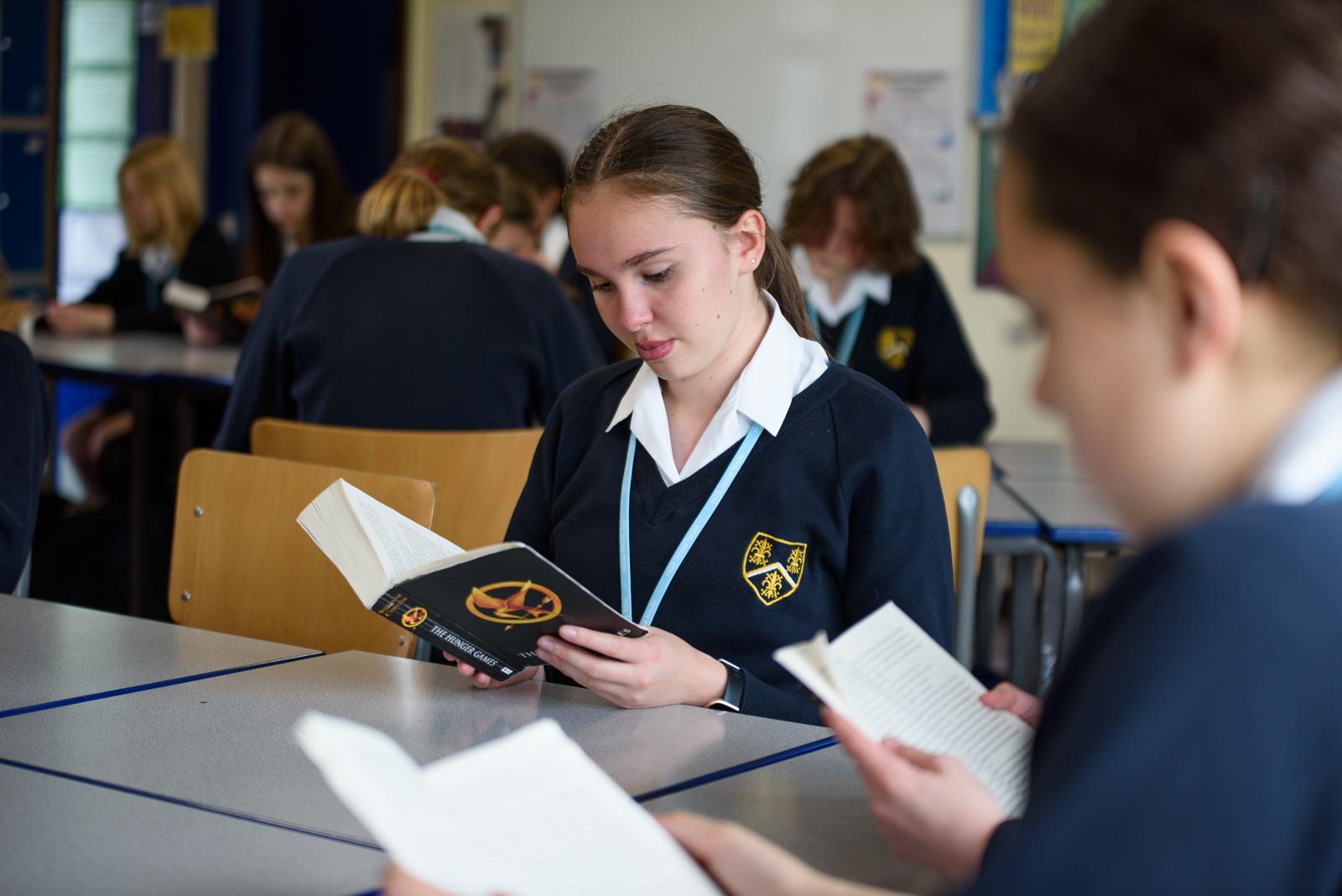 Photo of students reading in English class